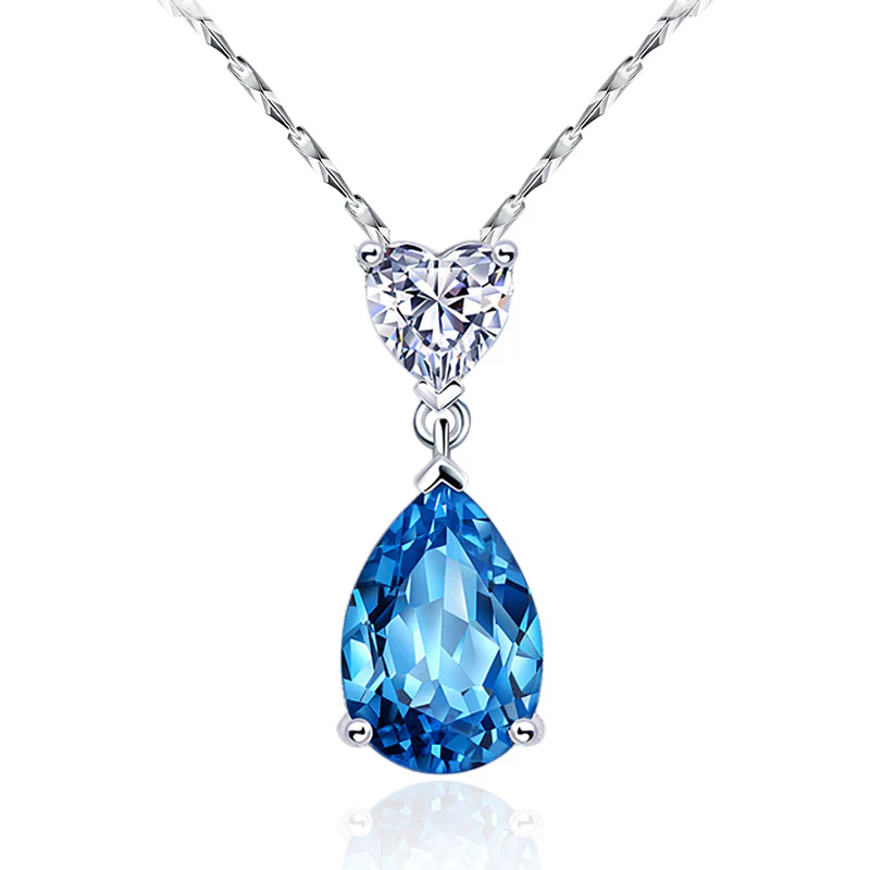Pendant - white gold 18k with blue topaz and diamond